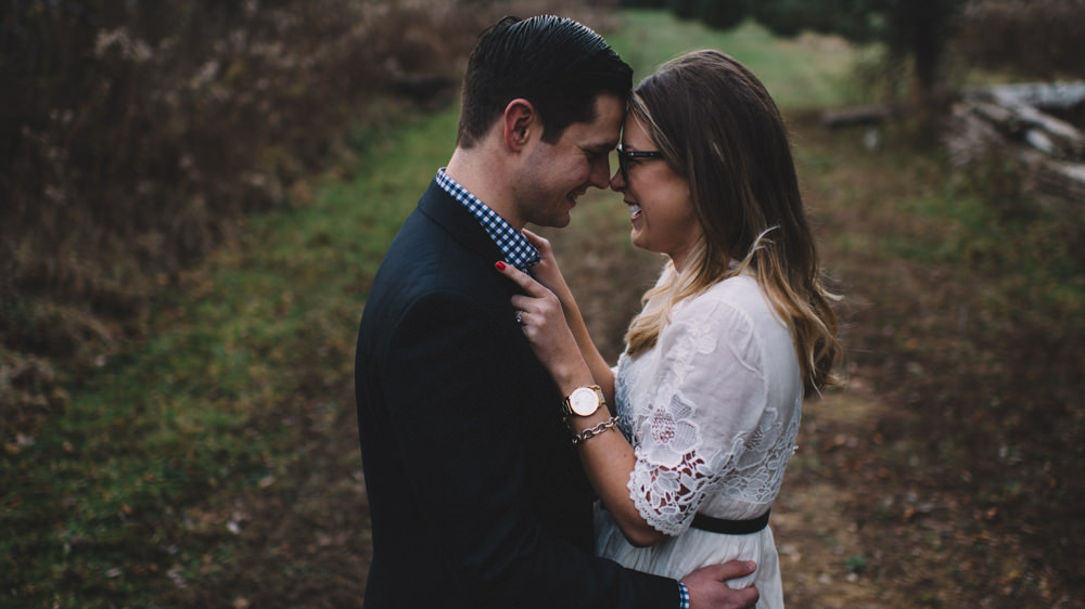 moody engagement photography in columbus ohio in the woods