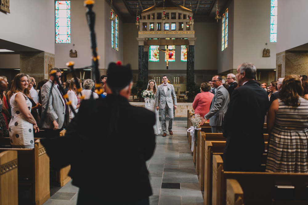 columbus bride and groom leaving the church