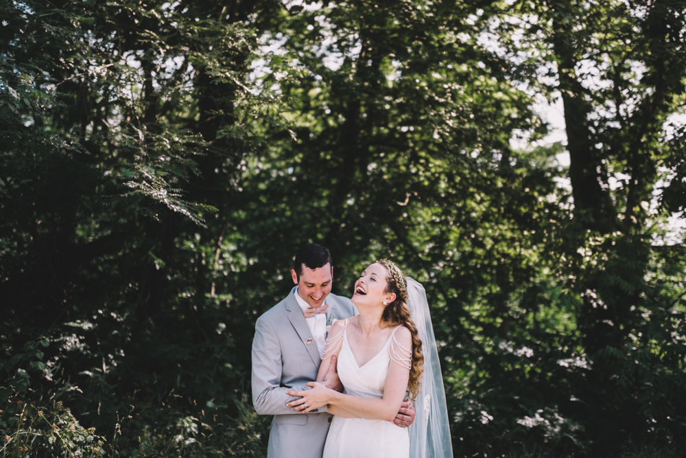 columbus bride and groom laughing