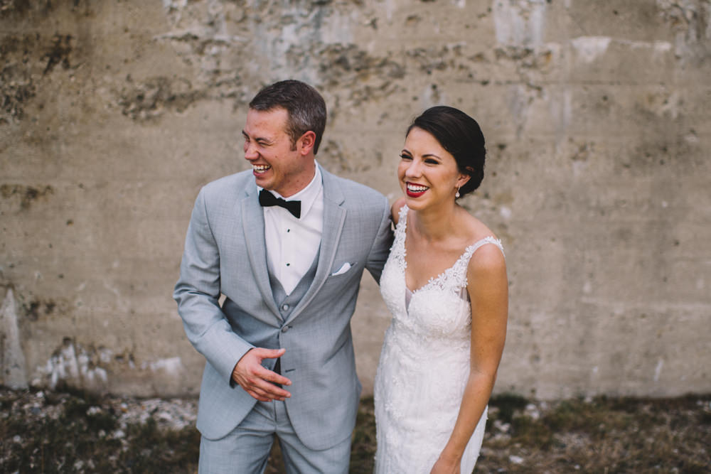 couple laughing together at station 67 wedding photography in columbus ohio