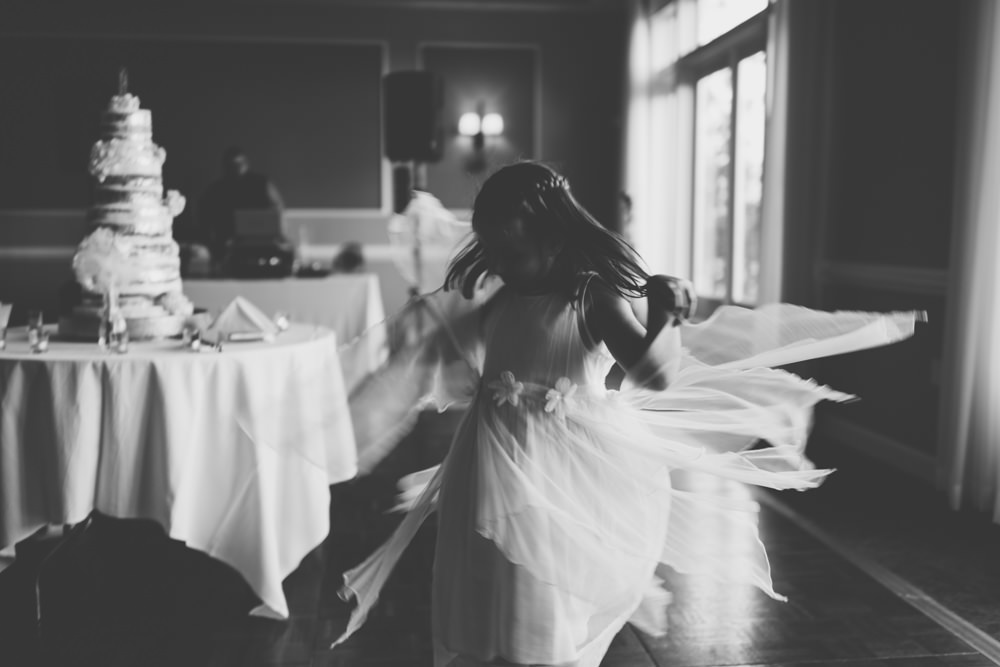 flower girls dancing at Wedgewood Country Club wedding photography in Columbus