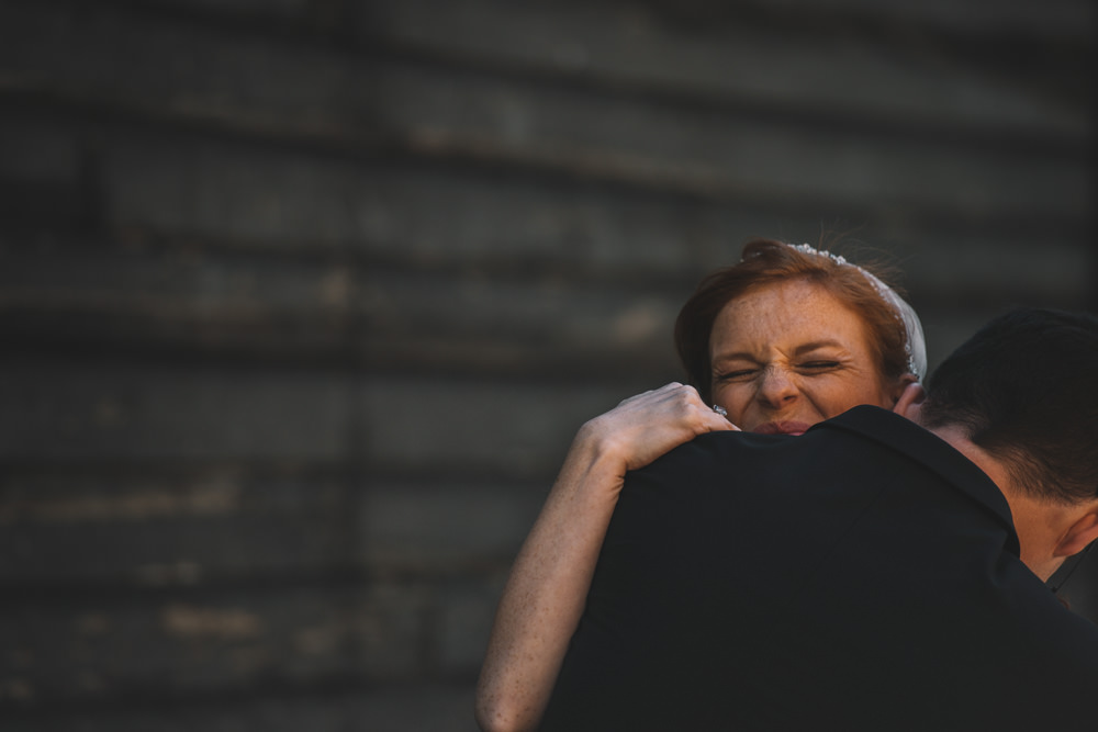 columbus ohio bride hugging and smiling 