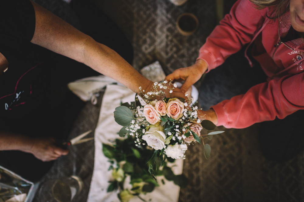 bride's aunts creating bouquets