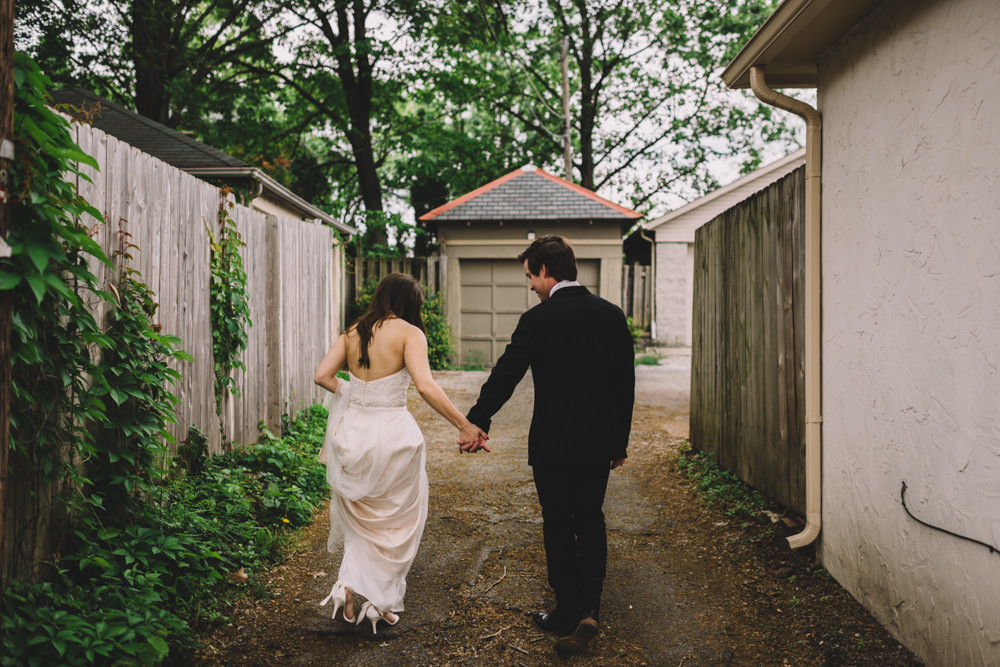 ohio couple walking through an alley